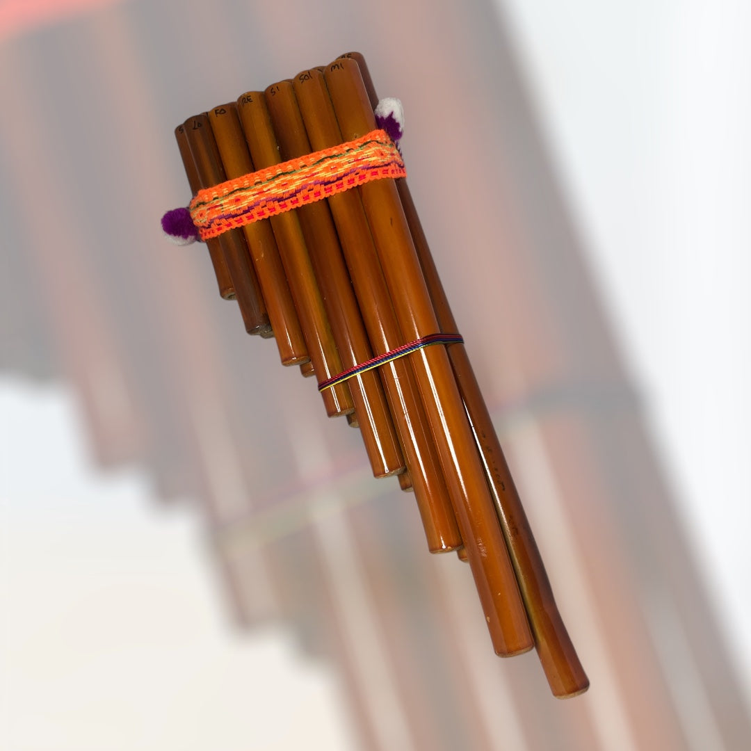 Woven pan flute instrument