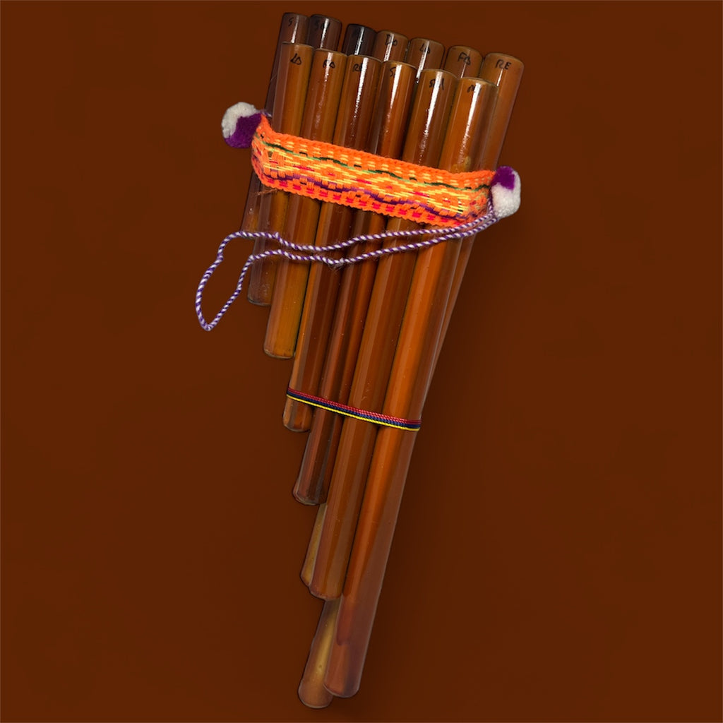 Woven pan flute instrument