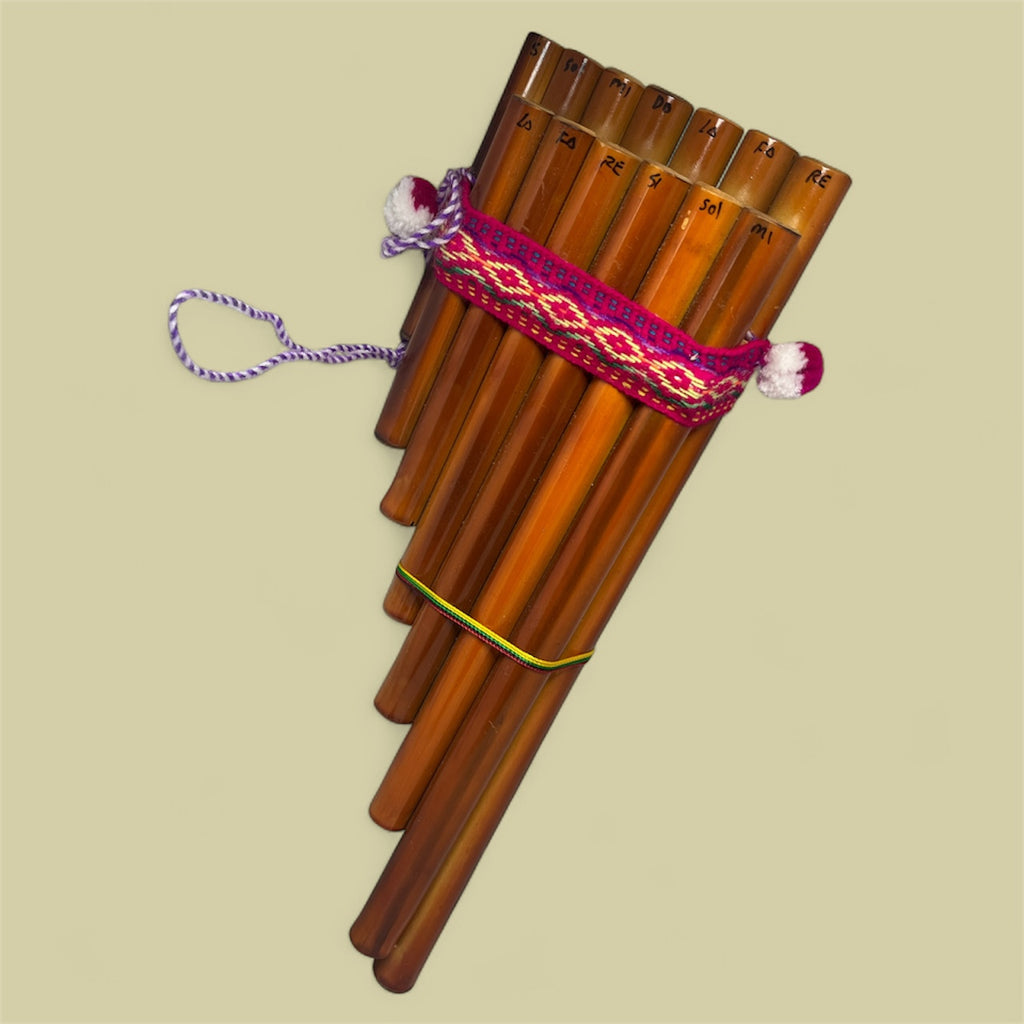 Woven pan flute instrument